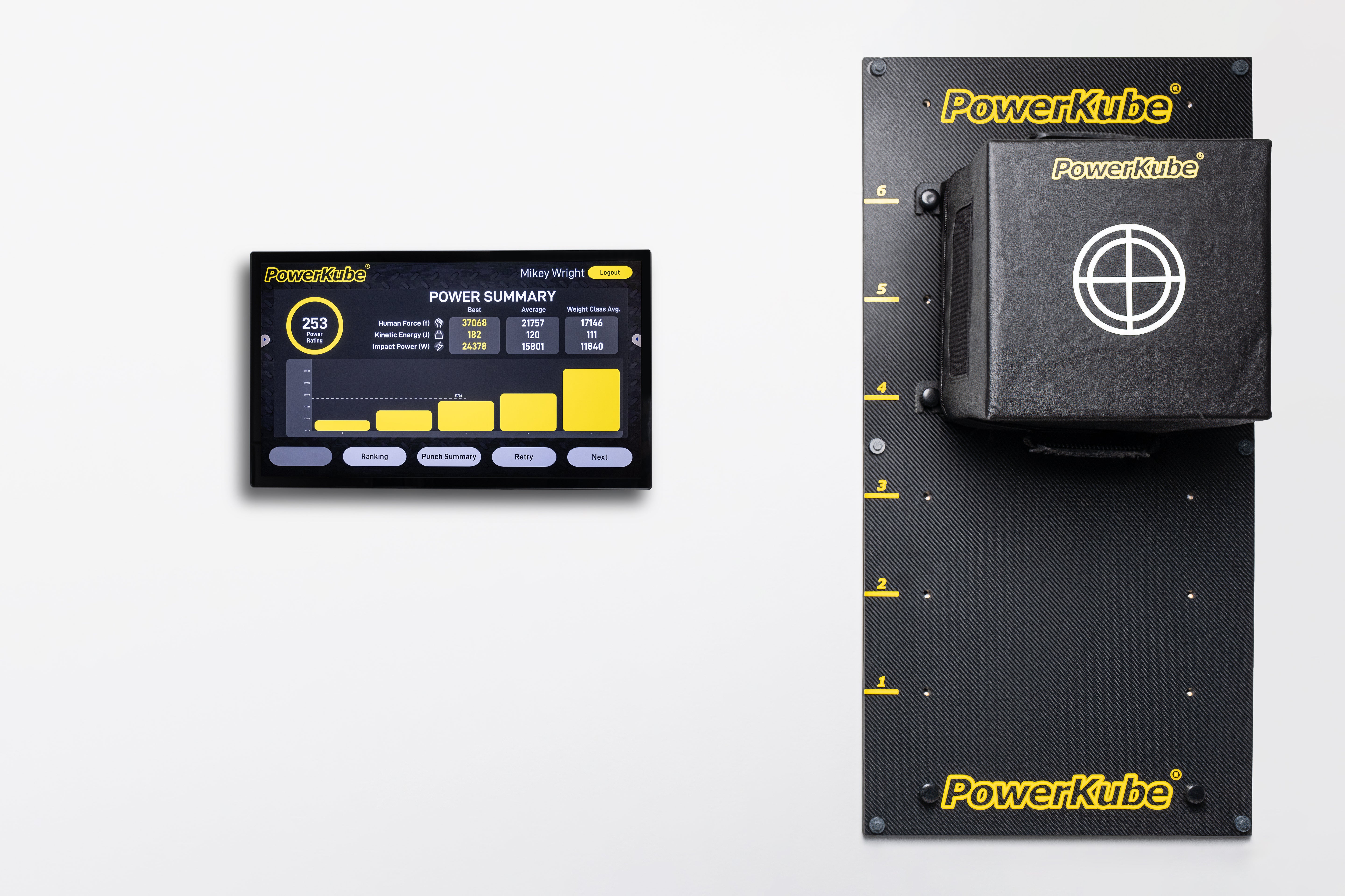 The image shows two products, the PowerKube Go on the left and the Gym-Lite wall mount on the right, both in black color with yellow accents. The PowerKube Go has a digital display and buttons, while the Gym-Lite wall mount features a circular target and adjustment dials.