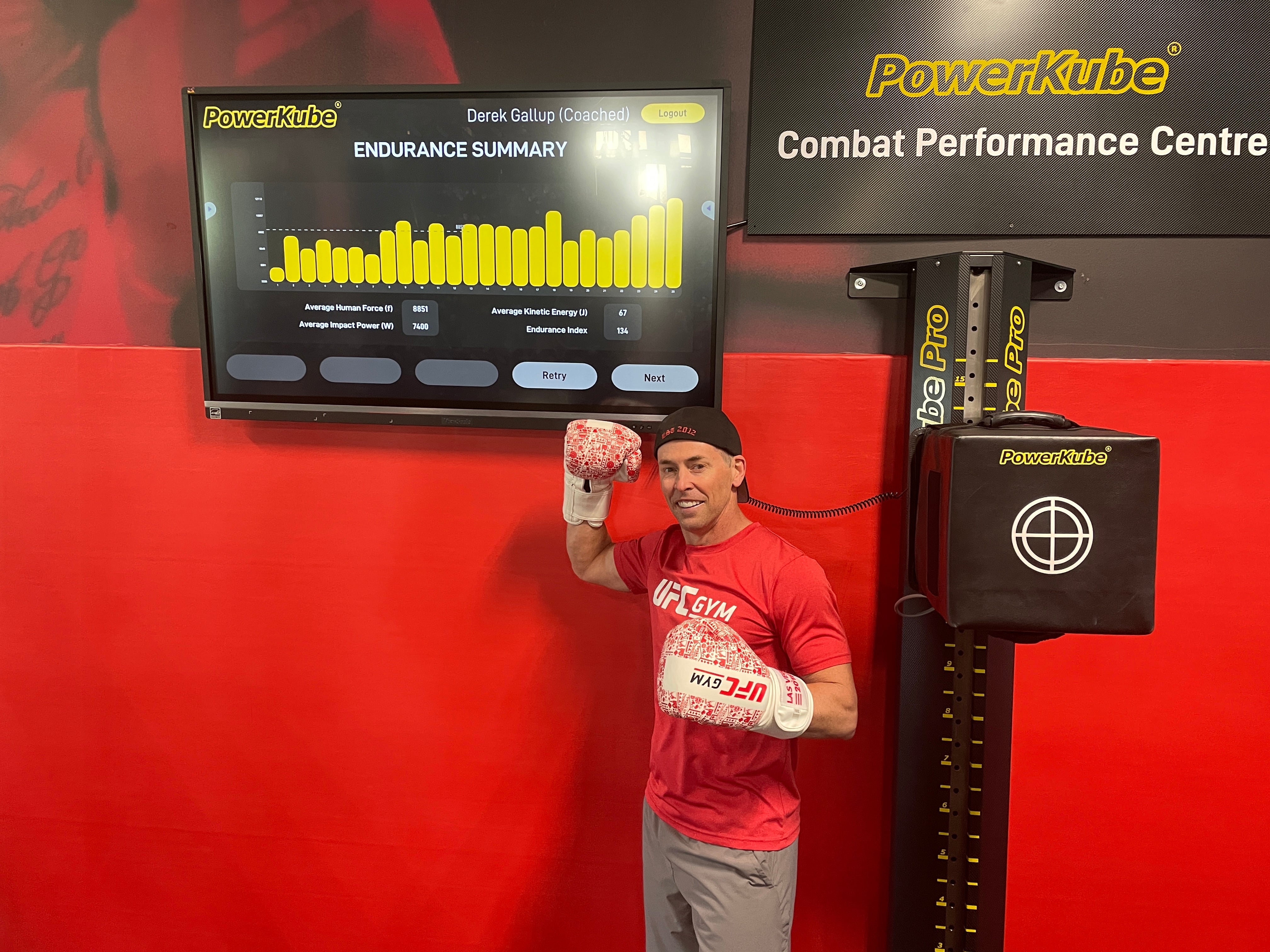 Man standing in front of PowerKube smart striking pad